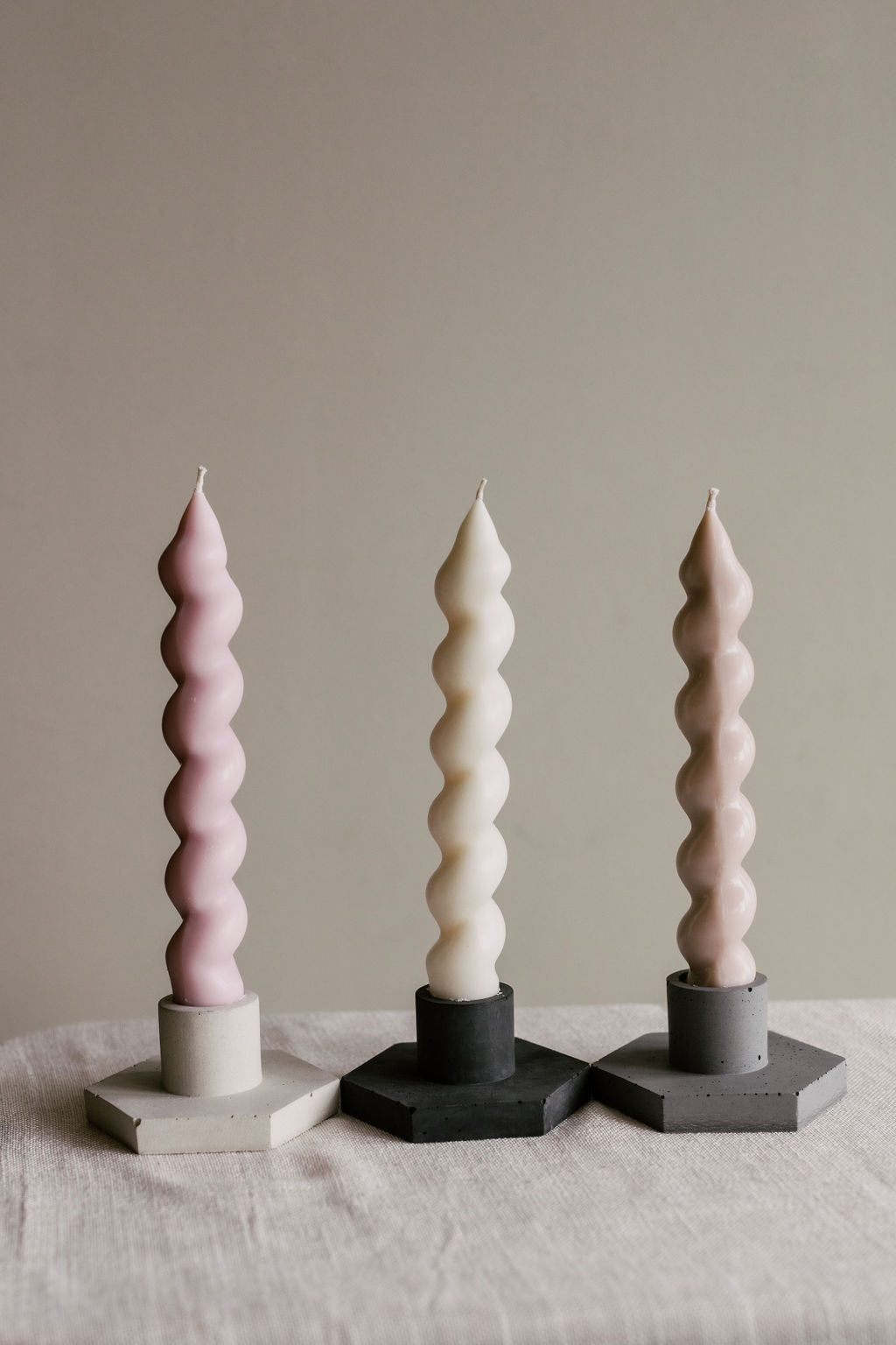 Long white spiral candle with cinnamon scent